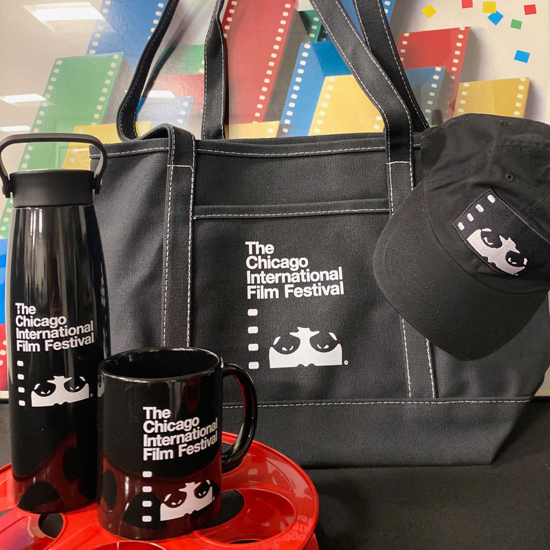 Festival branded canteen, coffee mug, tote bag, and hat.